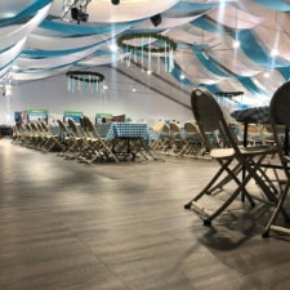 Chairs and tables set up on Smoked Oak flooring at Oktoberfest in Snowbird