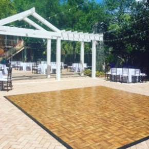 An oak-style dance floor is ready to welcome some dancing.
