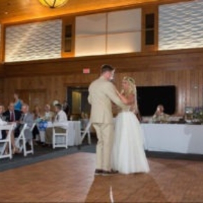 Oak style portable wedding dance floor inside a building