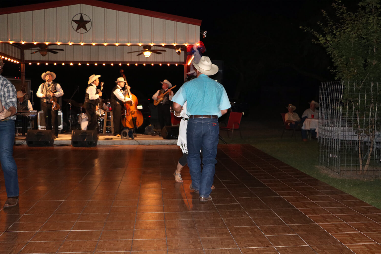Teak dance floor with Oak border at this Western-themed dance event