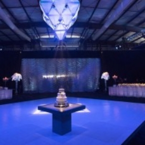 Slate White dance floor with edging in an elegant wedding event space