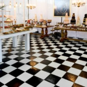 Wedding food tent floored with SnapLock's Slate Black and White dance flooring