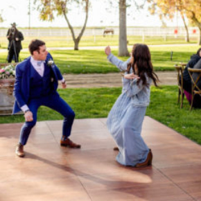 Wedding dance outdoors on Dark Maple Plus SnapLock Dance Floor