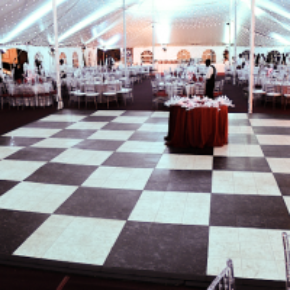 luxury black and white checkered flooring at large indoor wedding