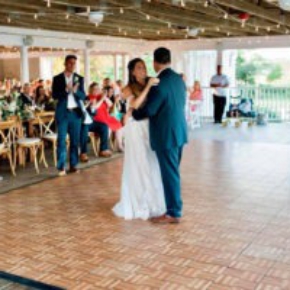 Dancing at a wedding on an Oak style dance floor