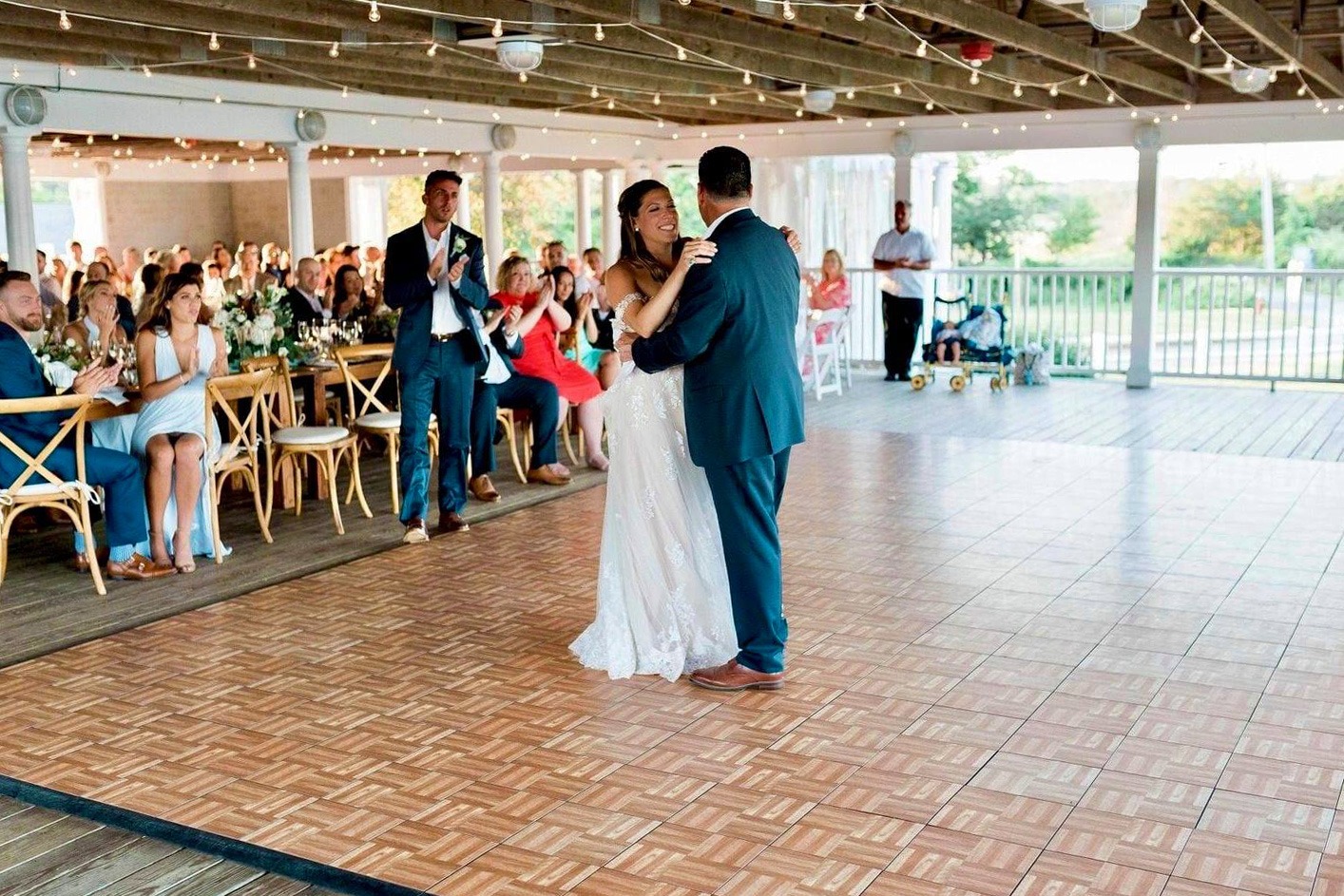 Dancing at a wedding on an Oak style dance floor