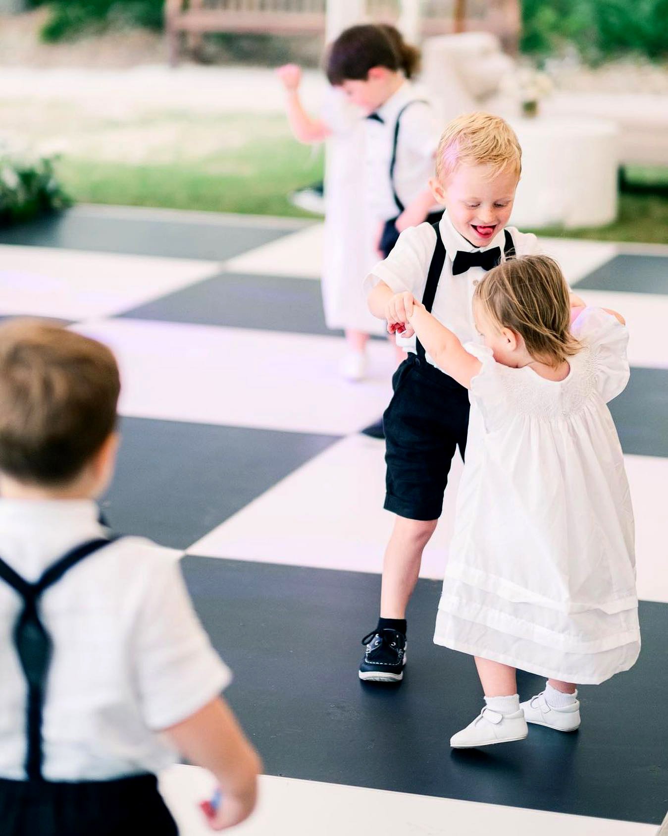 Kids dancing on a Slate Black and White Plus dance floor