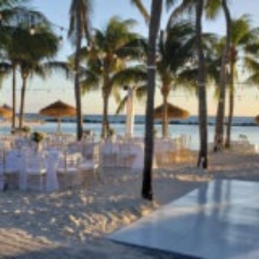 Slate white style dance floor at a beach wedding