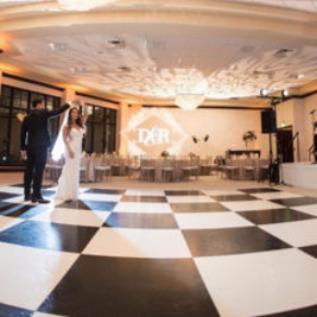 Slate Black and White Plus wedding dance floor at an indoor venue