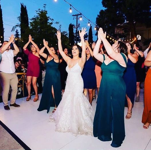 Wedding party dancing on a Slate White Plus style dance floor