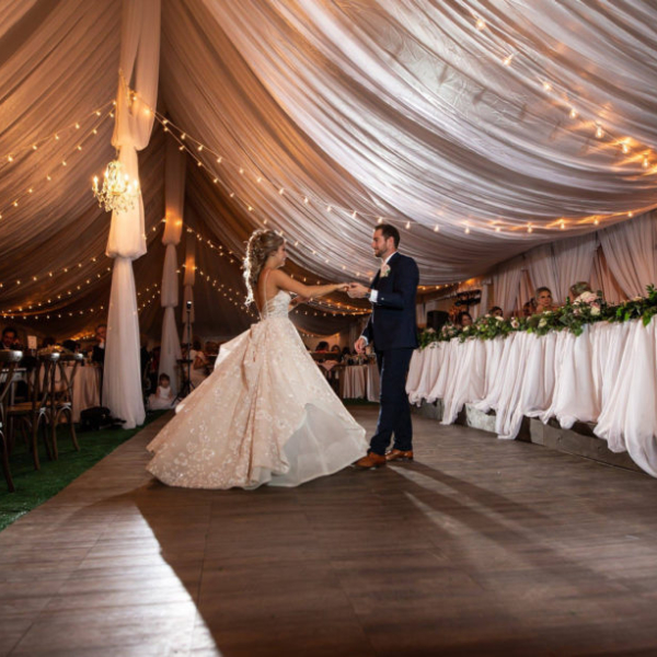 Beautiful tent wedding with Dark Maple style dance flooring