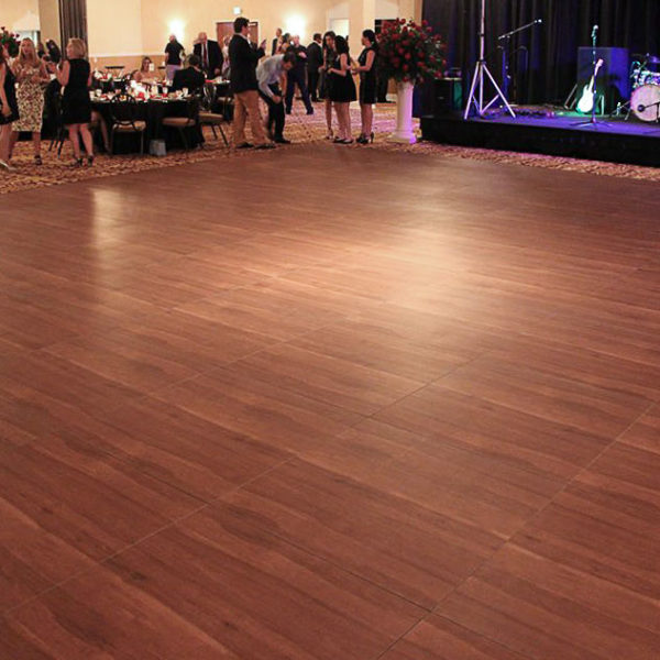 Dark Maple dance floor at a wedding with band