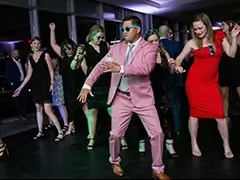 A party dancing on a ebony dance floor