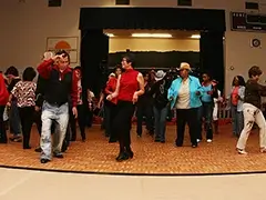 Line dancing on Oak dance floor