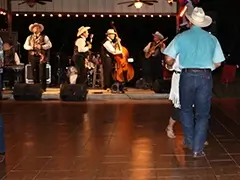 Western swing on a portable teak dance floor