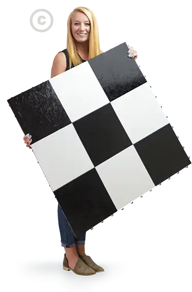 Woman holds a panel with Classic tiles.