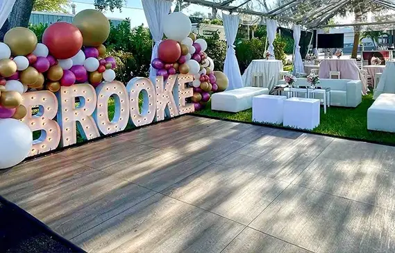 A Smoked Oak dance floor at Brooke's wedding.